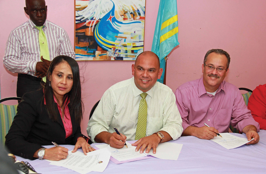 Odor Family, Ministers Oduber and de Meza sign.jpg