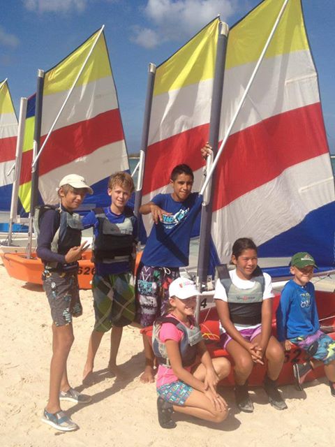 optimist sailors hanging out on the beach.jpg