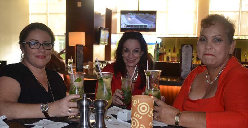 Yorleny, Marijke and Elly of the local press enjoying the Patron Mojito cocktails.jpg