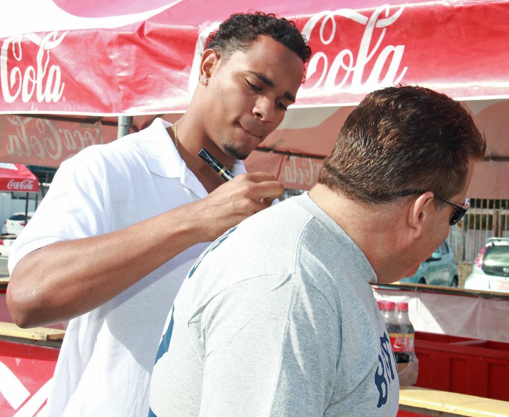 Signing-a-fans-shirt.jpg