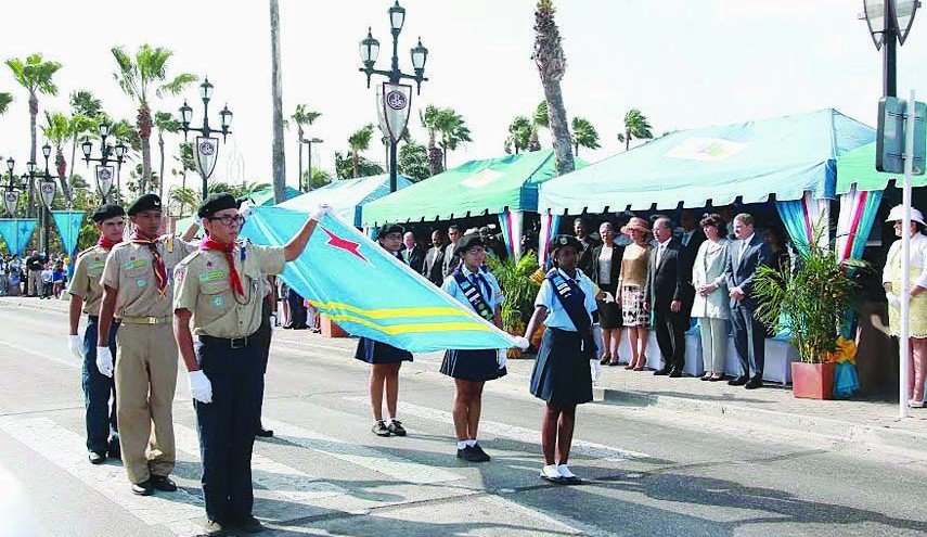 the Aruban flag being carried by scouts.jpg