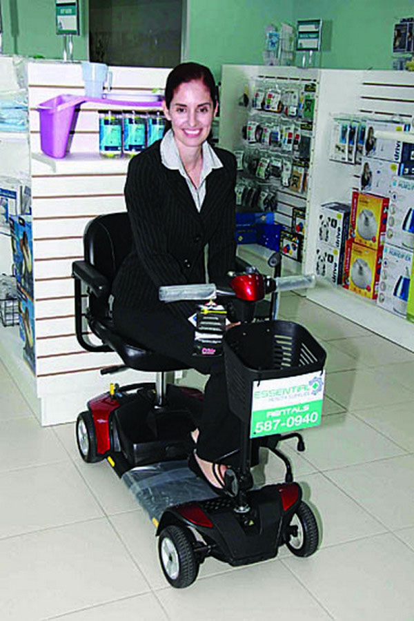 Owner of Essential Health Supplies on a Mobility Scooter