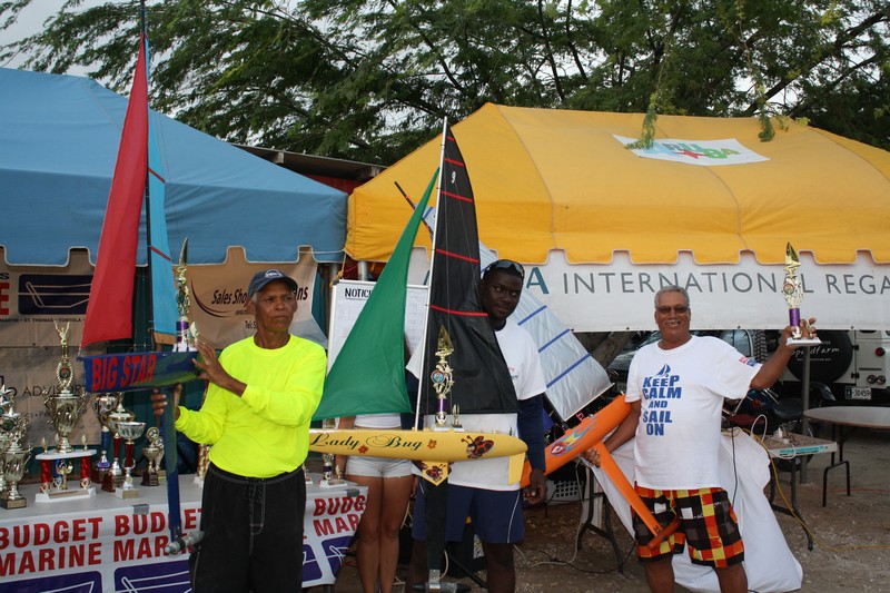 Micro boat sailors with trophees and boats.jpg