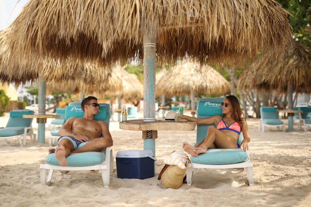 Boardwalk guests lounging on Palm Beach.JPG